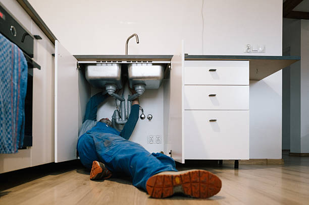 Professional Drain Cleaning technician working in Staley, NC